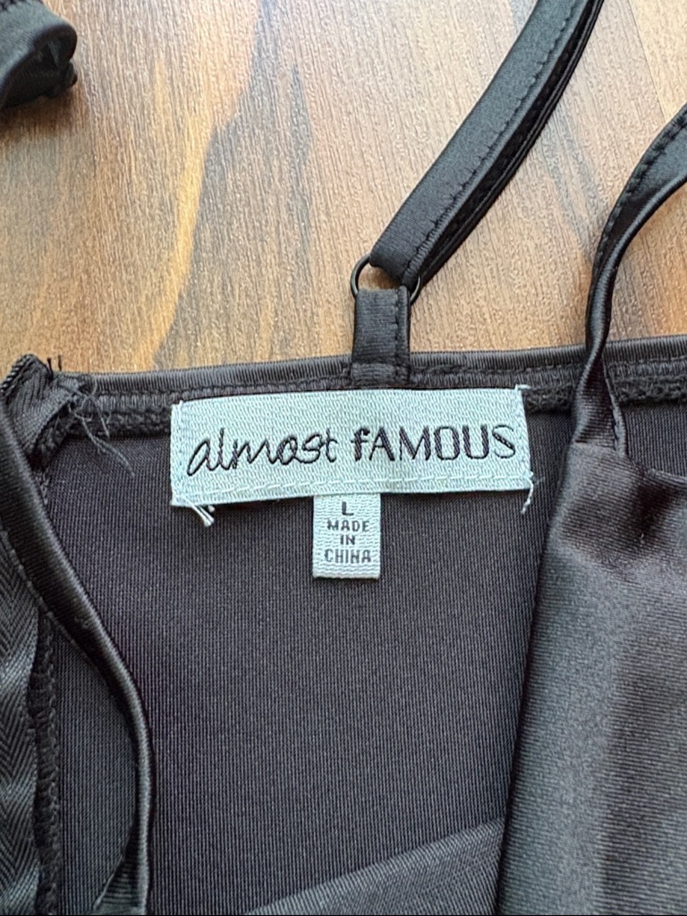 Almost Famous Woman’s Black Satin mini romper Size L - Picture 2 of 11